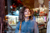 Young woman window shopping on the high street