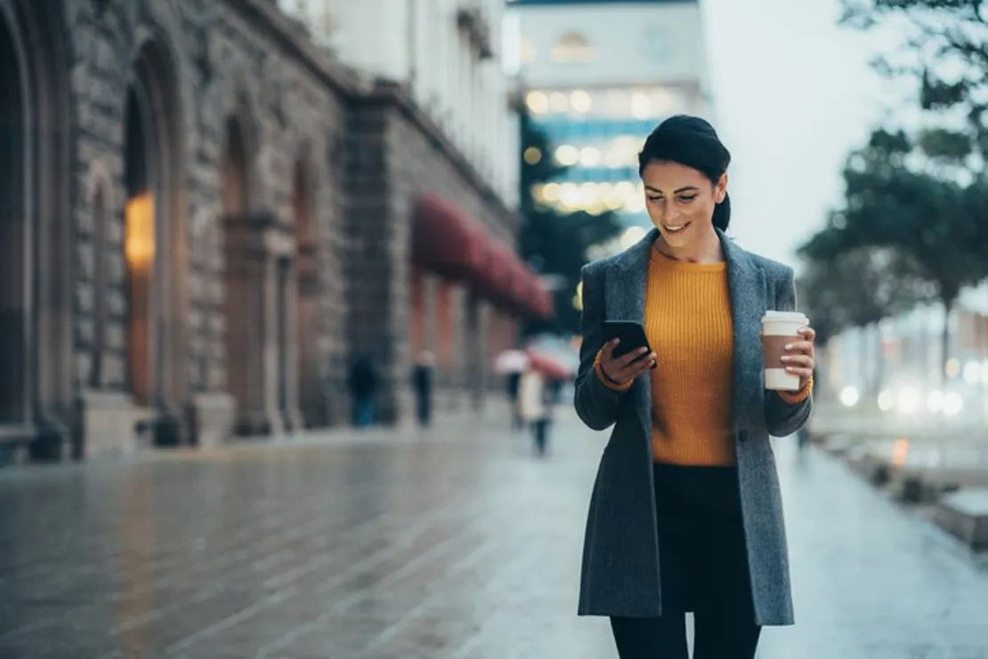 Woman In The City On Phone