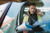 Manual Worker on Mobile Phone in His Van