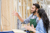 Male employee at a home improvement shop speaking to a customer