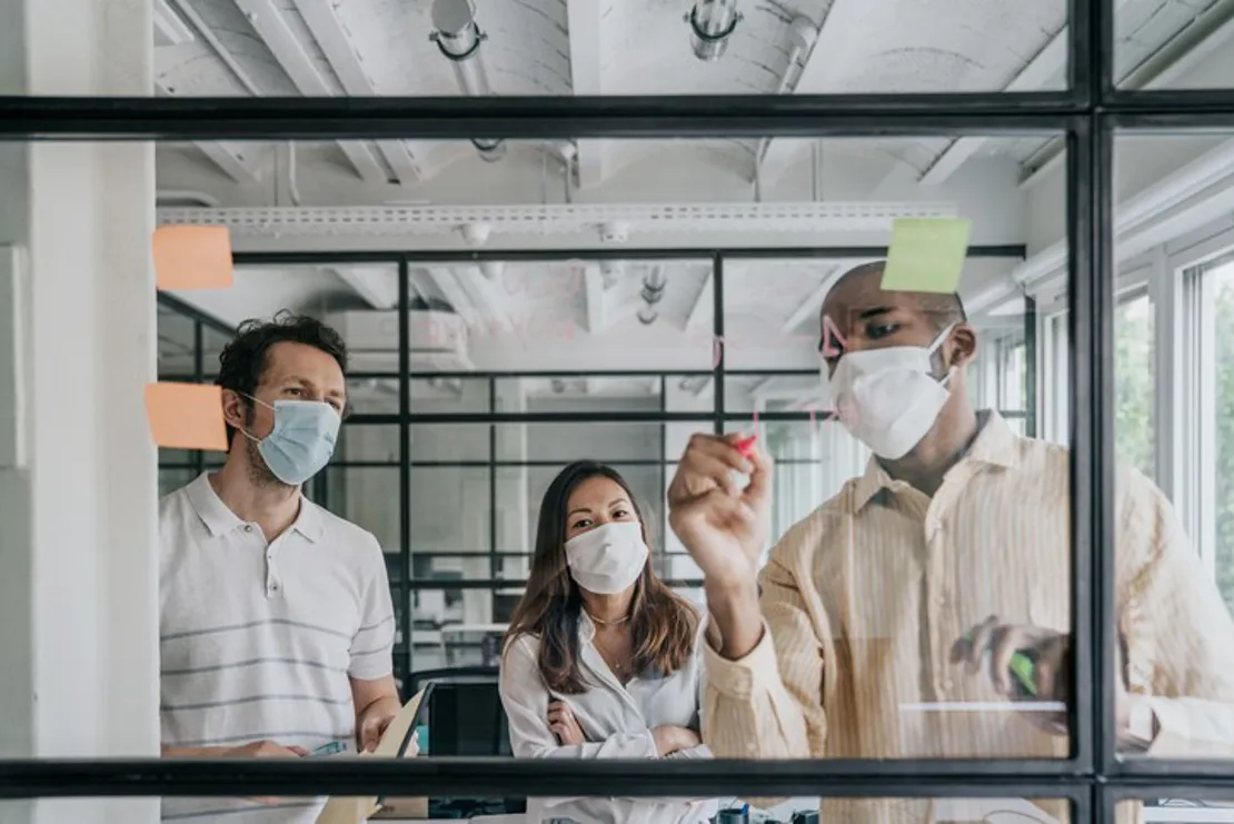 Businesspeople Brainstorming Work During The Covid 19 Pandemic