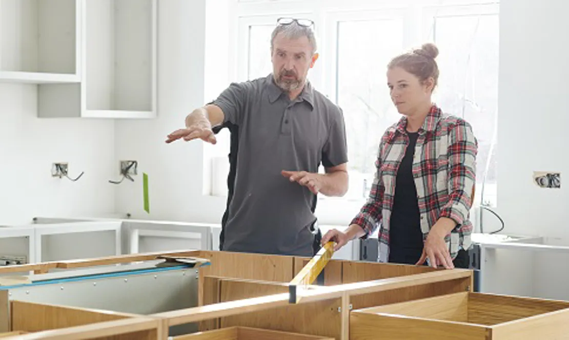 Home Improvement Professional Advising A Customer