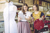 Two woman discussing a purchase in a clothing shop 