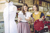 Two woman discussing a purchase in a clothing shop 