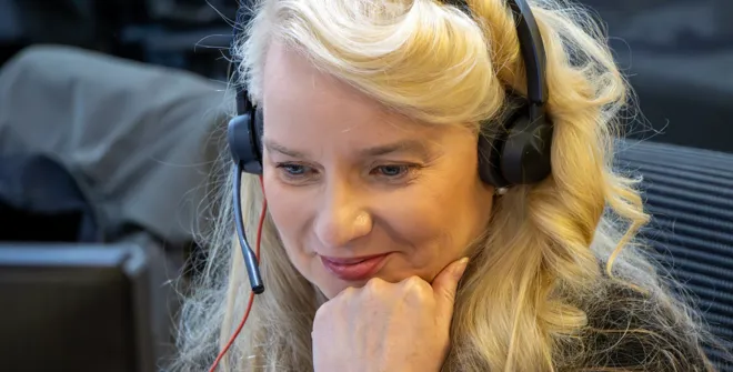 Novuna National E-Commerce Manager, Elaine Keith, speaking to a customer on a headset