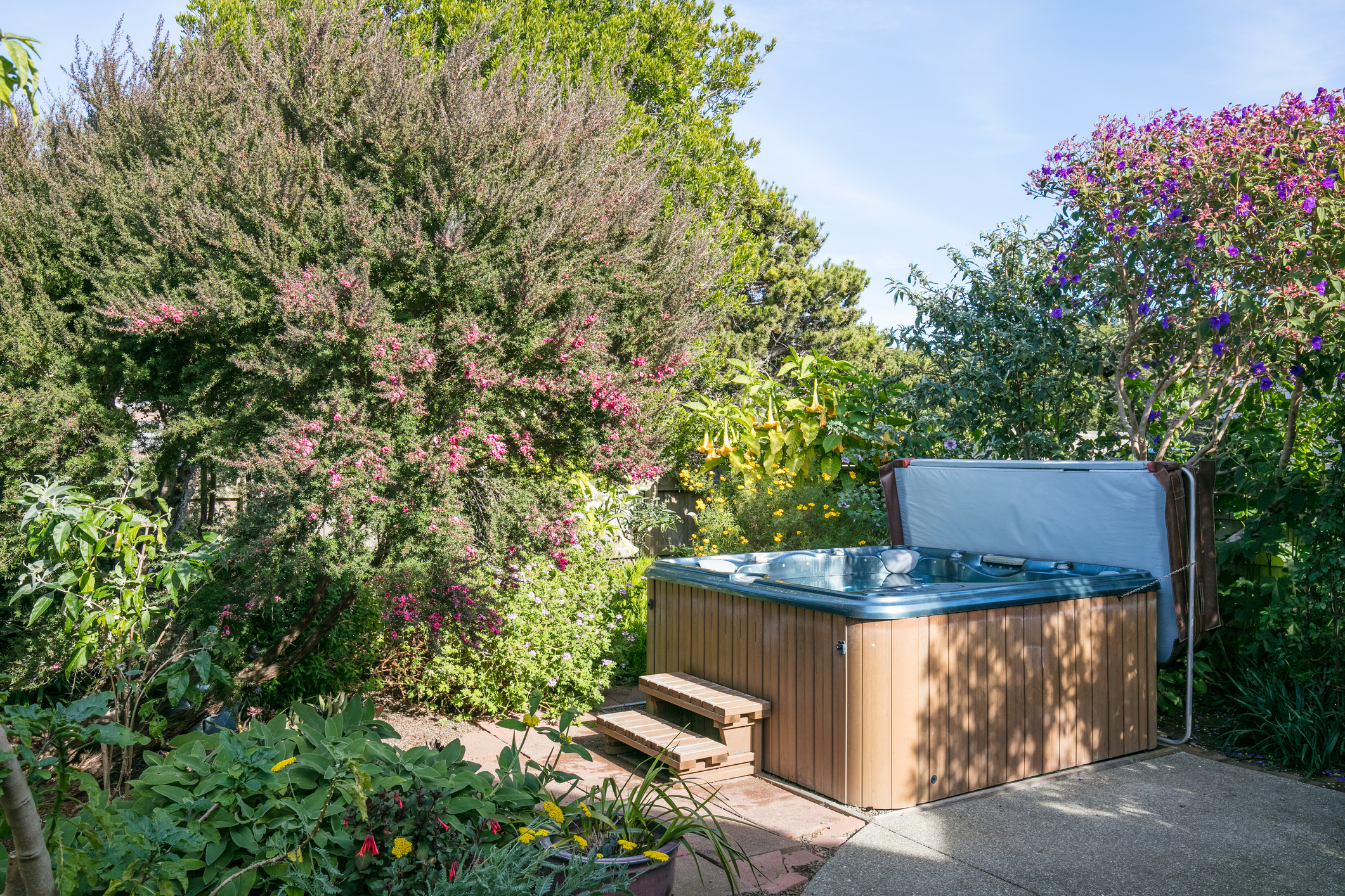 Wooden hot tub in a garden